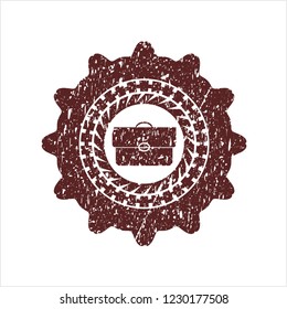 Red briefcase icon inside distress grunge style stamp