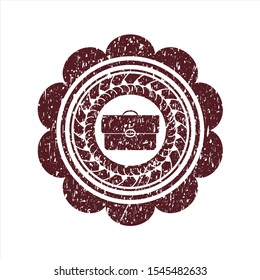 Red briefcase icon inside distress rubber texture