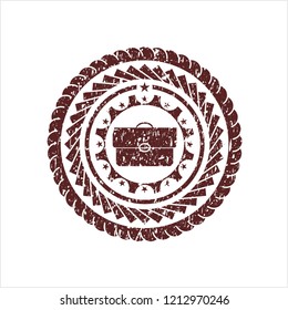 Red briefcase icon inside rubber stamp