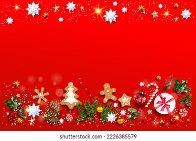 Red bright holiday background with gingerbread and Christmas decorations. Balls, stars, gingerbreads, fir tree branches. Winter holiday illustration