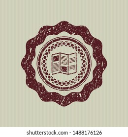 Red brochure icon inside distress grunge seal