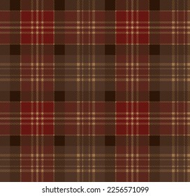Red and brown tartan plaid. Scottish pattern fabric swatch close-up. 