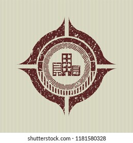 Red buildings icon inside distressed grunge seal