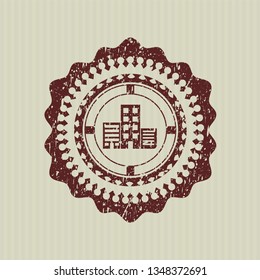 Red buildings icon inside rubber seal with grunge texture