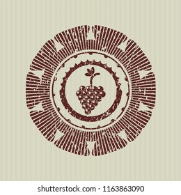 Red bunch of grapes icon inside distress rubber seal