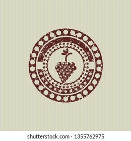 Red bunch of grapes icon inside rubber grunge texture seal