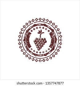Red bunch of grapes icon inside rubber stamp