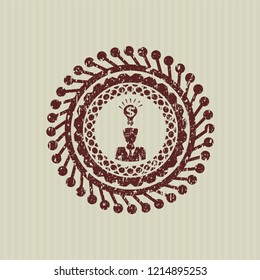 Red business idea icon inside rubber stamp with grunge texture