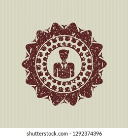 Red businessman icon inside distressed rubber grunge texture stamp