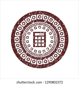 Red calculator icon inside distress rubber stamp with grunge texture