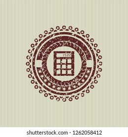 Red calculator icon inside distressed rubber stamp with grunge texture