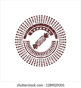 Red candy icon inside distress rubber stamp