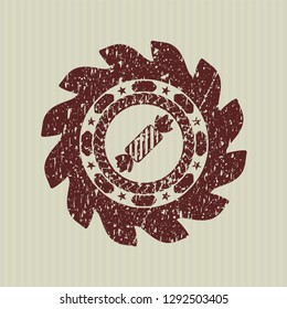 Red candy icon inside grunge stamp
