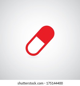 red capsule symbol on gray background 