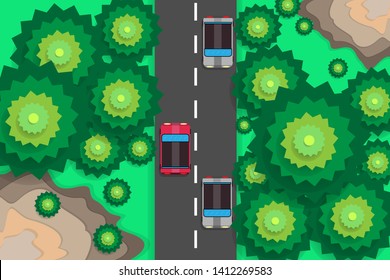 Red car drive along the road cross through green tree forest and mountain in bird eye view 