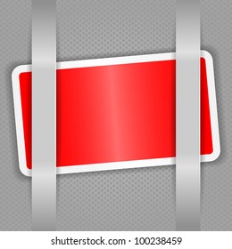 Red card against the gray cells. Gray tape.