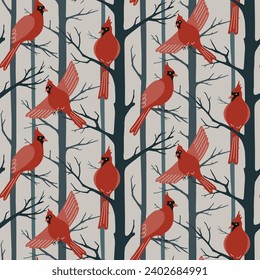 Red cardinal birds seamless pattern. Northern cardinal birds and bare trees silhouettes background. Winter surface pattern design with flying forest birds for fabrics, wallpaper, wrapping design