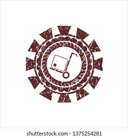 Red cargo icon inside rubber grunge texture seal