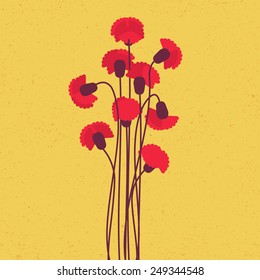 Red carnation bouquet with branch on yellow background