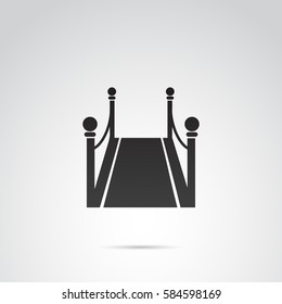 Red carpet icon isolated on white background. Vector art.