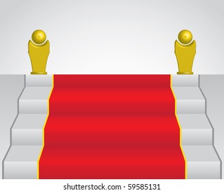 Red carpet on staircase and two golden statue