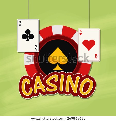 Red casino chip with hanging playing card on grungy green background.