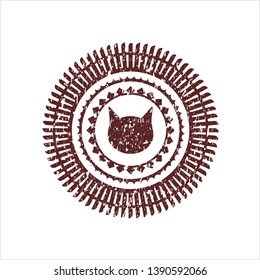 Red cat face icon inside rubber grunge seal
