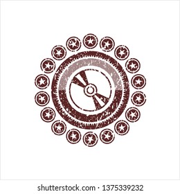 Red CD or DVD disc icon inside rubber grunge stamp