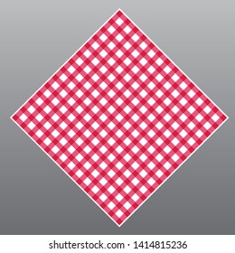 Red checkered tablecloth on table on gray background