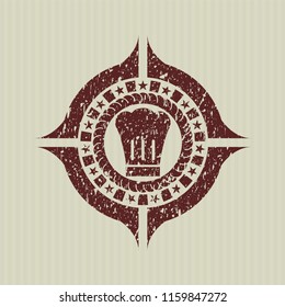 Red chef hat icon inside distress rubber stamp