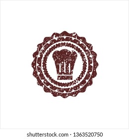 Red chef hat icon inside distressed grunge seal