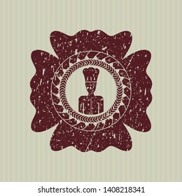 Red chef icon inside rubber grunge texture seal