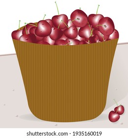 rote Kirschen mit Tropfen in einem braunen Korb auf dem Tisch