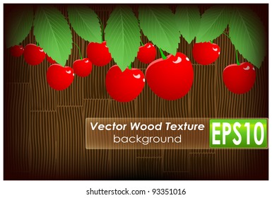 Red cherries and green foliage with grunge wooden texture
