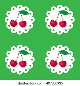 Red cherry pattern on green
