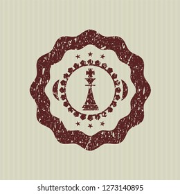 Red chess king icon inside distress rubber grunge texture stamp