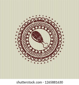 Red chicken leg icon inside rubber stamp with grunge texture