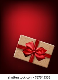 Red Christmas background with gift box and bow. Vector top view illustration.