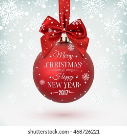 Red Christmas ball with ribbon and a bow, on winter background with snow and snowflakes. Merry Christmas and Happy New Year 2017. Greeting card template. Vector illustration.