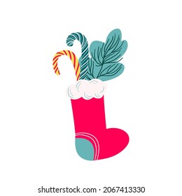 Red christmas boot with a gift, candy, Christmas tree branch