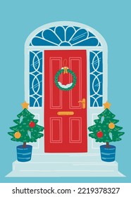 Red Christmas house door on a blue background. The entrance to the house is decorated with Christmas trees and a wreath. Vector artistic illustration for postcards, banners and print.