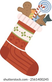 Red Christmas stocking with traditional decorations filled with candy, gingerbread man, star shaped cookies and wrapped sweets celebrating Christmas and winter holidays