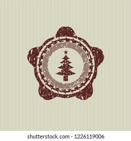 Red christmas tree icon inside rubber grunge texture seal