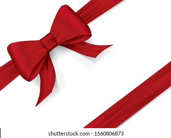 Red Christmas or Valentines day present with red shiny ribbon bow