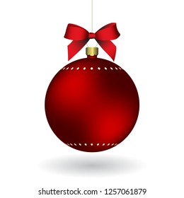 Red Christmass ball with ribbon hanging on a golden chain