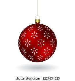 Red Christmass ball with snowflakes print hanging on a golden chain