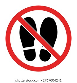 A red circle with a diagonal line through it, overlaying a black silhouette of two footprints. Indicates no walking or entry.