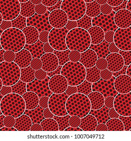Red circles of different sizes in black polka dots. Seamless texture.