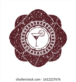 Red cocktail glass icon inside rubber texture