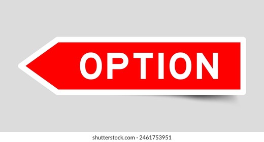 Red color arrow shape sticker label with word option on gray background